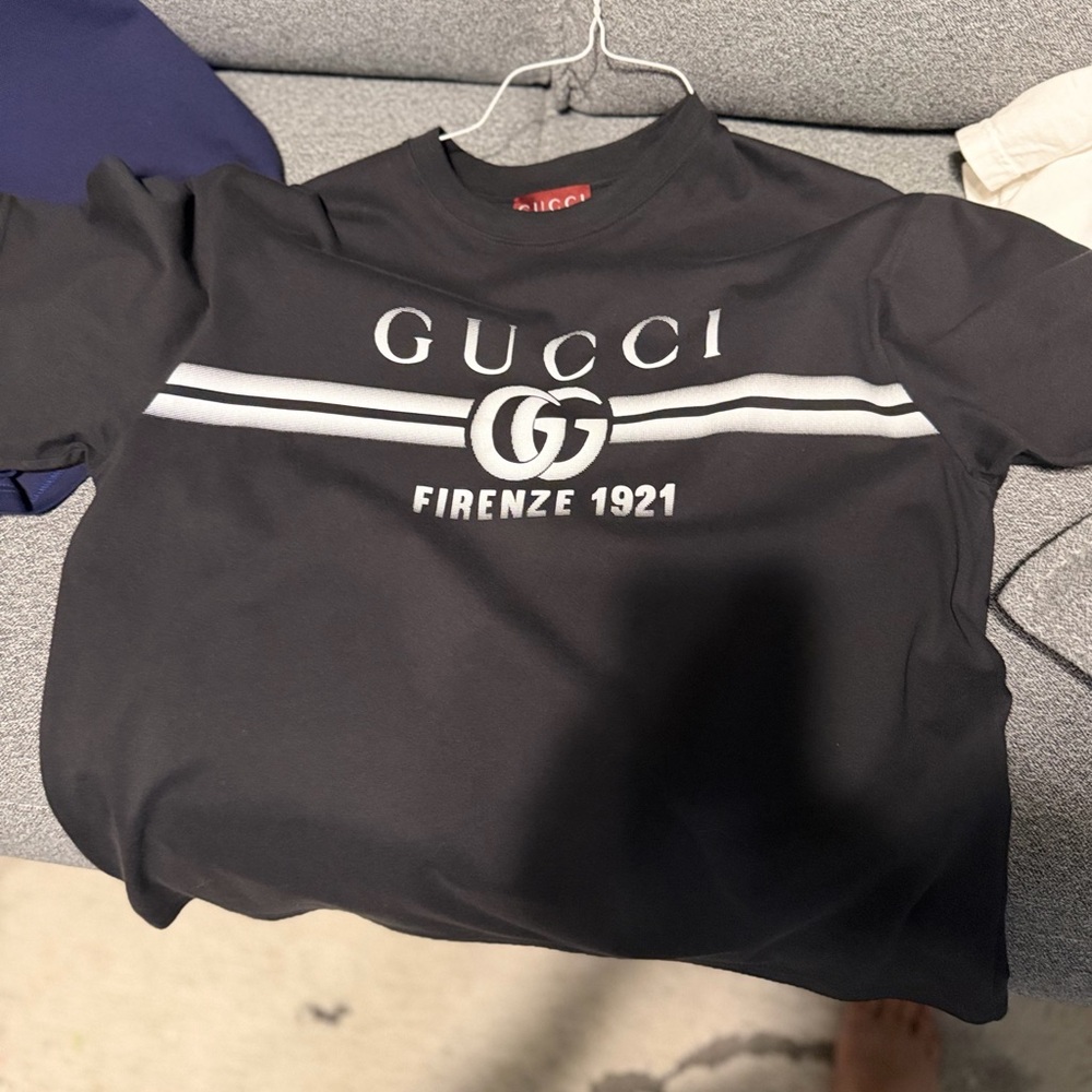 Gucci Black Tee with White Stripes and Logo